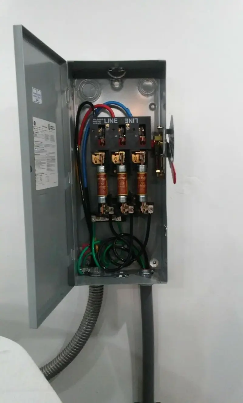 Three-phase disconnect switch installed for Smoke Detector Installation in Bay Harbor Islands
